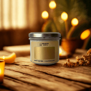 Warm and cozy background for a candle with tropical and sweet notes. Soft golden and amber light, gentle reflections, slightly smoky atmosphere, wooden table or surface, rich textures of wood and fabric, warm and inviting mood, luxurious and intimate feel, soft focus, bokeh, elegant and comforting composition.